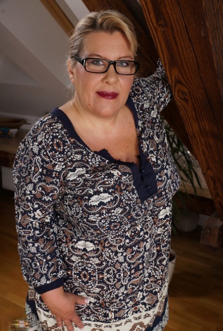 Overweight German housewife straddles her boy toys after removing her dress 65950961