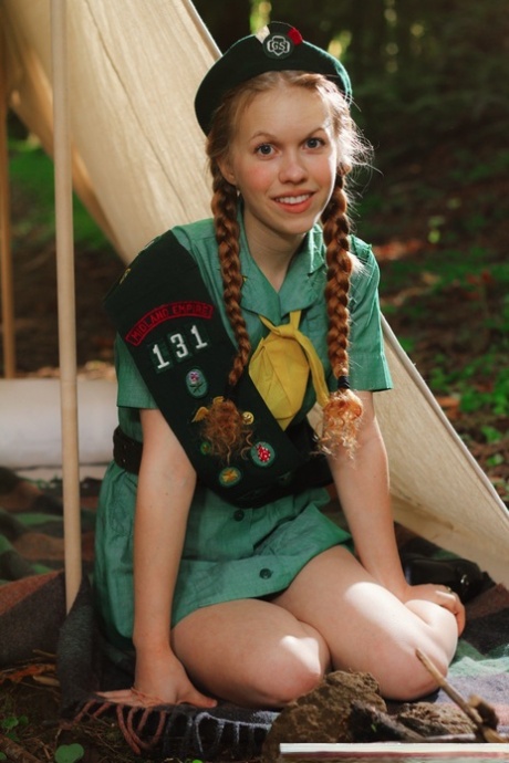 Redheaded Girl Scout Dolly Little gets naked outside her tent in beret 44557876