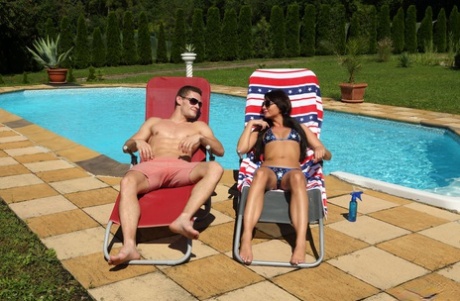 Amateur couple Max and Anastasia fuck on a poolside chair in their sunglasses