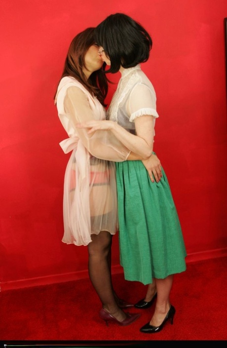 Mature lesbians Julia & Dirty Angie move in for a kiss in lingerie and nylons 21692408