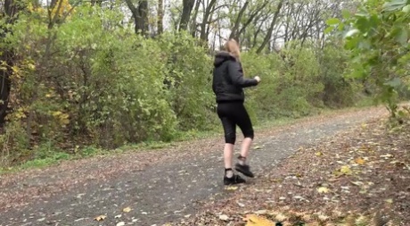 White girl Grace takes a piss on a stone dust path in the woods 12150574