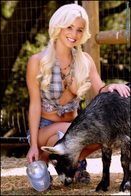 Platinum blonde babe Spencer Scott feeds goats before getting naked in heels 71113164