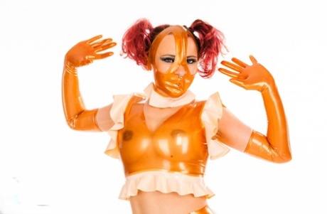 Redhead amateur Lara Larsen sports pigtails well modelling in latex 21477571