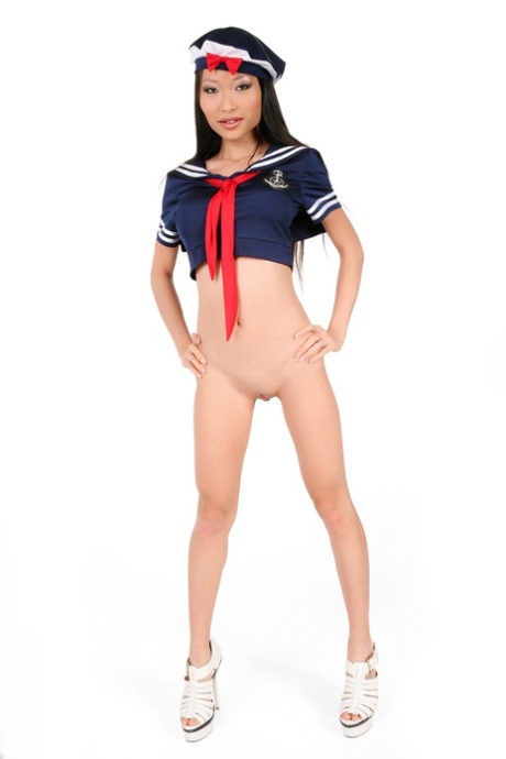 Adorable Asian model Pussykat looses her assets from a cute sailor outfit 91852769