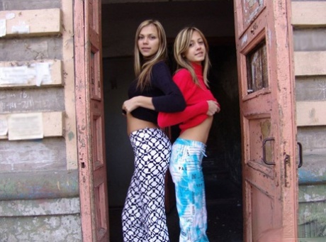 Young lesbians Laura and Katrina kiss on the lips while fully clothed 48550865