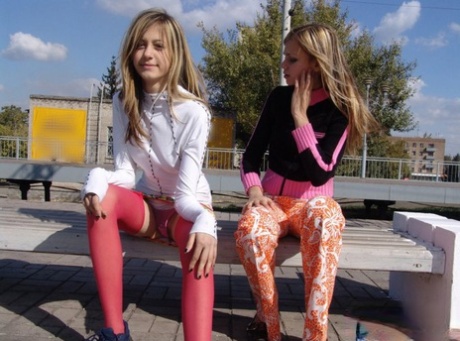 Teen lesbians Katrina & Laura expose their tits while wandering railway tracks 90228040