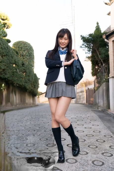 Japanese schoolgirl flashes her upskirt underwear before stripping to socks 55028447