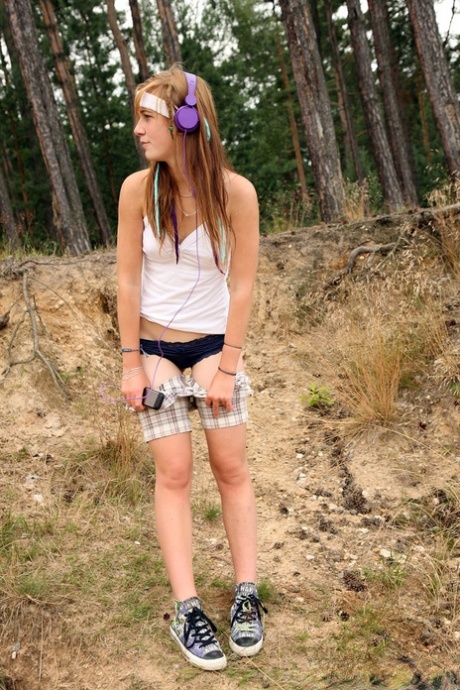 Music loving horny teen pauses on the wooded path to masturbate to orgasm 49190515