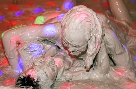 Caucasian girls get totally messy during mud wrestling action at a club 91814612