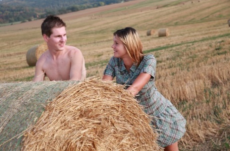 Young couple Havel & Dominika have sex against a round bale in a hayfield 40567101