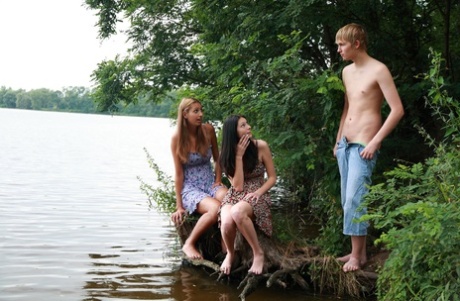 Young girls get caught kissing before a threesome with a boy in a lake 75665902