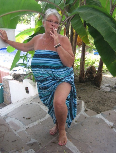 Old woman Girdle Goddess smokes before exposing her fat body on her patio 78059275
