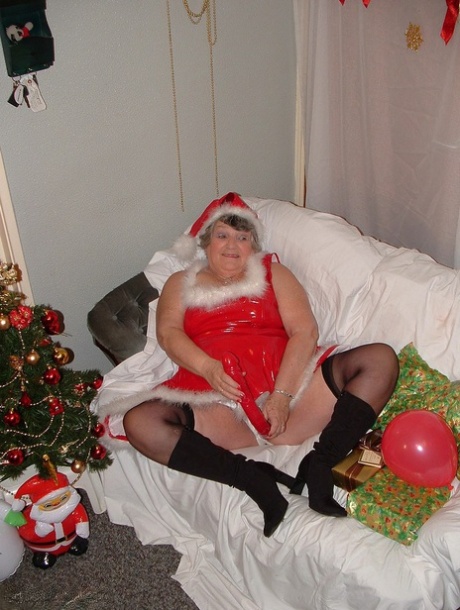 Obese nan Grandma Libby sucks and fucks Santa on a covered couch