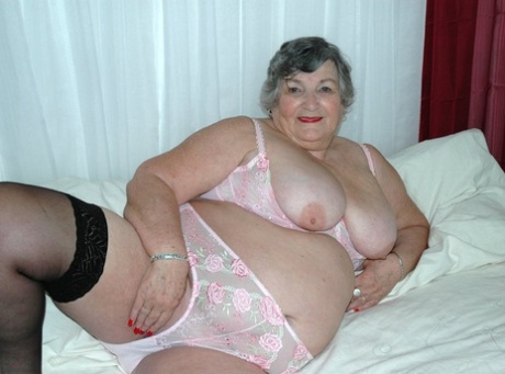 Obese old woman Grandma Libby masturbates on her bed in stockings 24587296