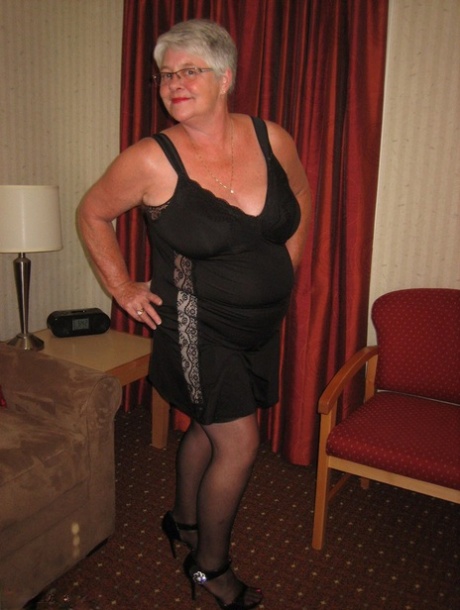 Fat granny Girdle Goddess sport a no panty upskirt in a black slip and girdle 28223525