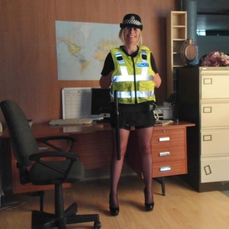 Mature UK policewoman Barby Slut sets her tits free of her uniform 77910184