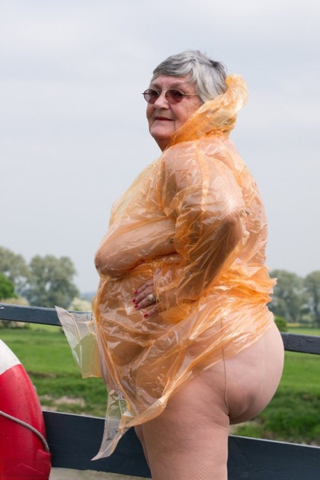 Obese British amateur Grandma Libby casts off a see-through raincoat 67380183