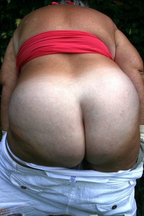Fat nan Grandma Libby bares her huge ass before licking a nipple in her yard 99602018