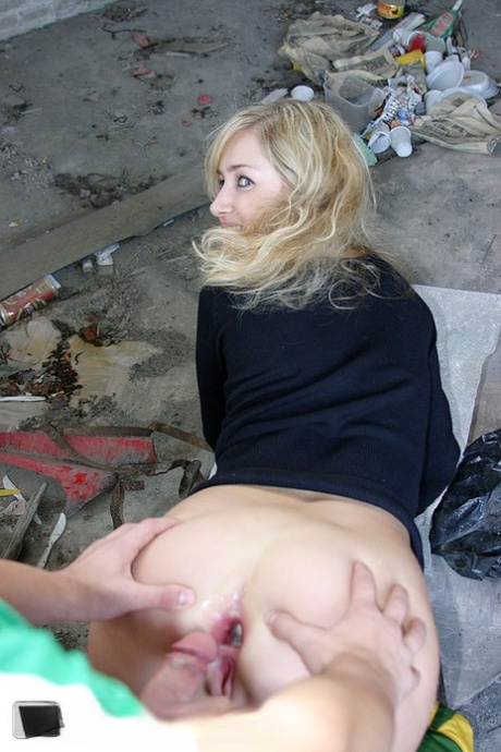 Blonde girl does hardcore anal in an abandoned building with strangers 19084586