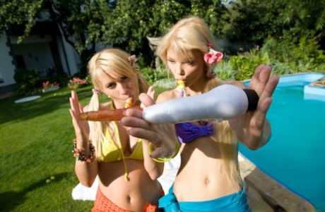Blonde teens remove bikinis during poolside lesbian sex 98789014