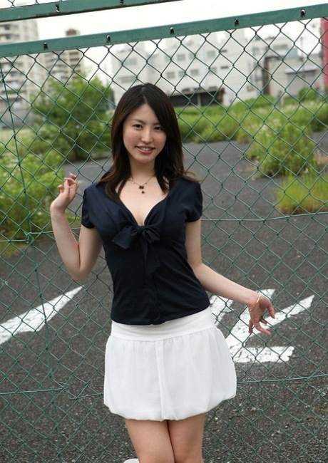 Japanese teen Takako Kitahara exposes upskirt panties on slide at playground 13900637