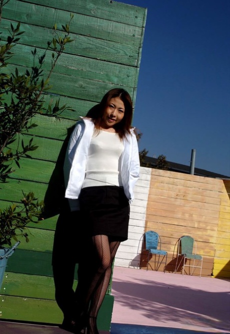 Redheaded Japanese teen Sumire shows her naked body in OTK socks and boots 51768367