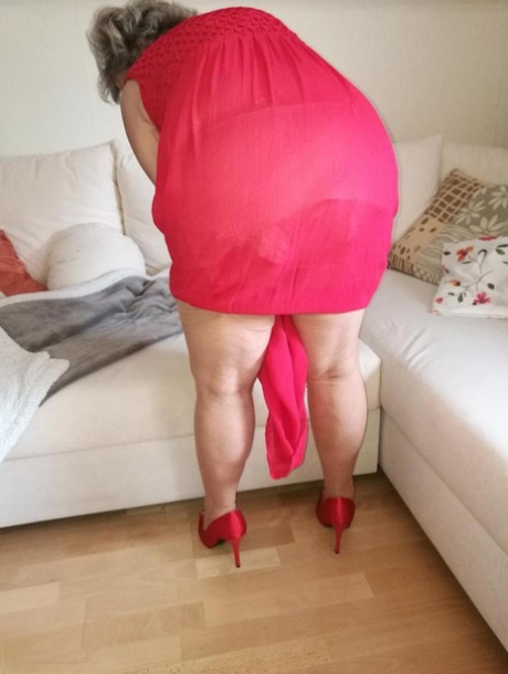 Horny oma Caro hikes up long red dress to spread her hairy vagina 54145450