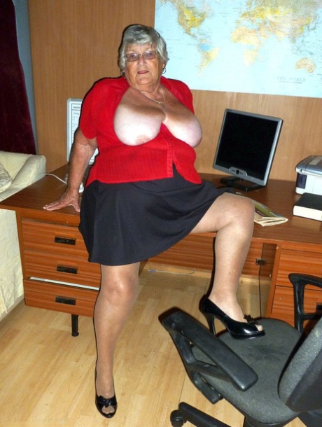 Obese British nan Grandma Libby gets totally naked on a computer desk 56801546