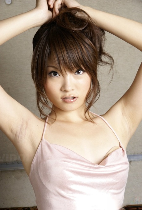 Beautiful Japanese girl Yuuna Yano poses non nude in bell bottom jeans 68040914
