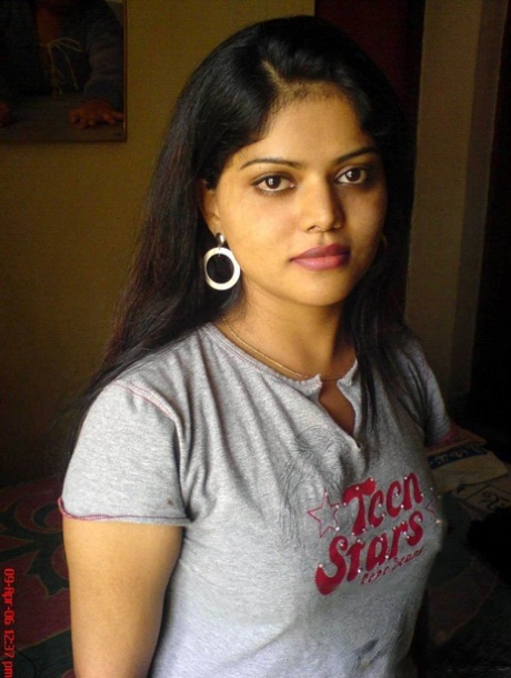 Petite Indian girl uncups big naturals after removing blue jeans 13813385