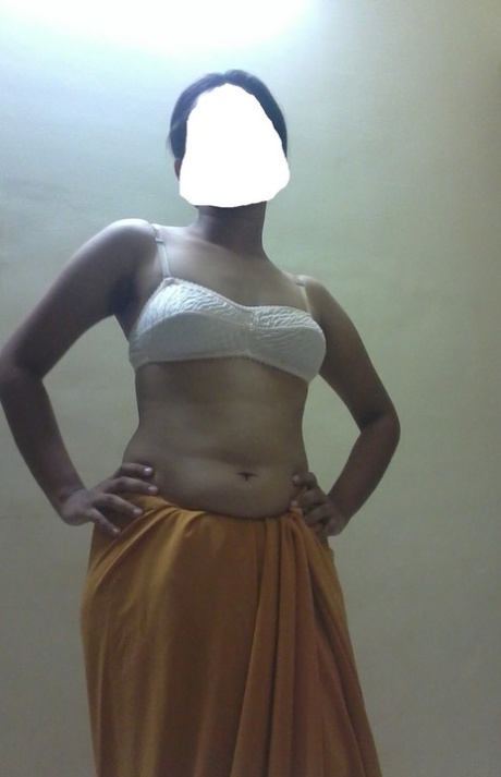 Indian solo girl poses in her brassiere with her face blurred out 36151118