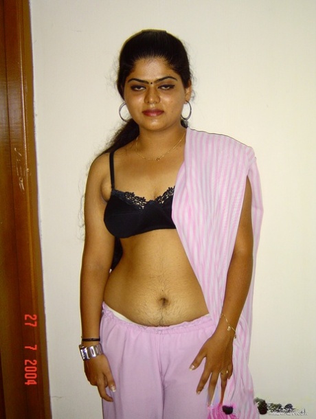 Indian girl Neha sets her natural boobs free of a black brassiere 46101482