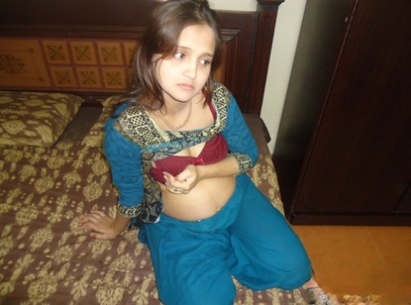 Pregnant Indian girl exposes her milk filled tits and swollen belly 62850810