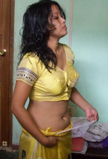 Indian wife changes attire while pleasuring her husband on bed POV style 68554838