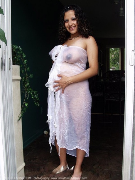 Pregnant Latina girl displays her swollen belly and vagina as well 65128023