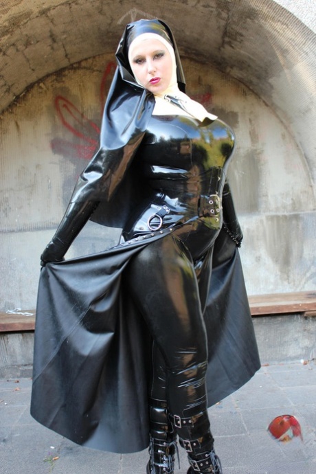 Solo model poses indoors and outdoors in latex Mother Superior attire 32733627