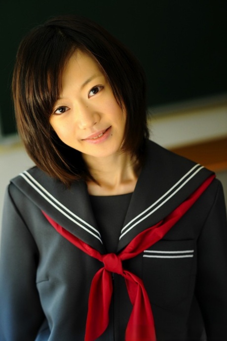 Barely legal Japanese student shows her bare knees in her school uniform 34110404