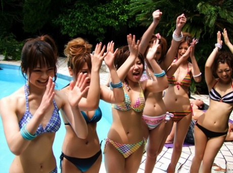 Japanese girls suck the jizz from cocks during a BJ competition by the pool 85711568