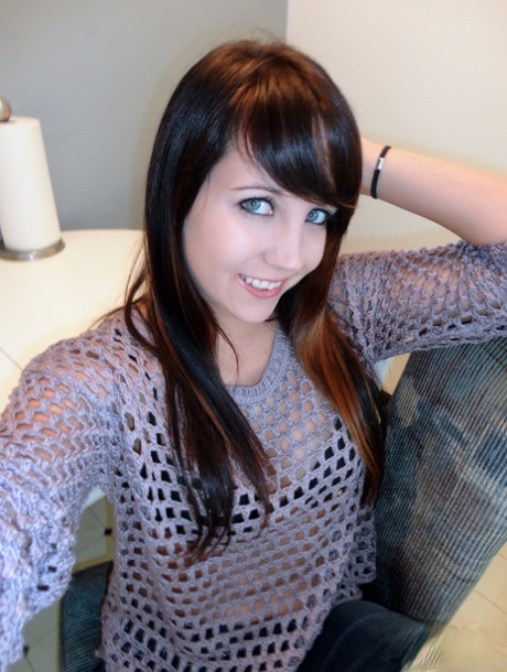 Teen girl Andi Land uncovers her firm tits while wearing a macrame sweater 95103699