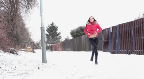 Cynthia Vellons melts snow as she pees outside 15324941
