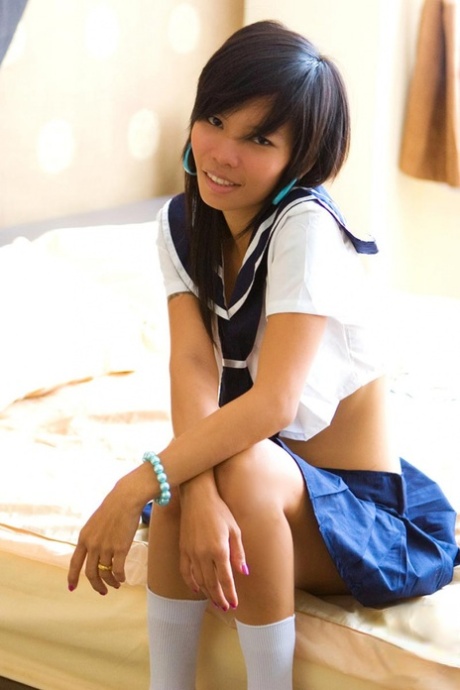 Asian girl Puy removes her sailor uniform after a BJ and facial cumshot 73060777