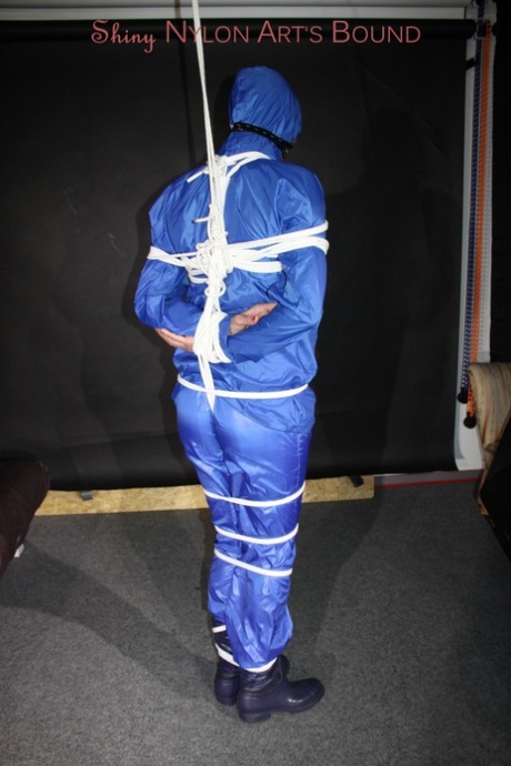 Watching sexy Pia being tied and gagged overhead with ropes and a ballgag