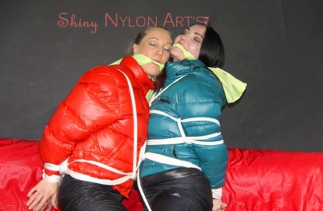 Two white girls are left tied up and gagged in winter coats and nylon pants 13971371