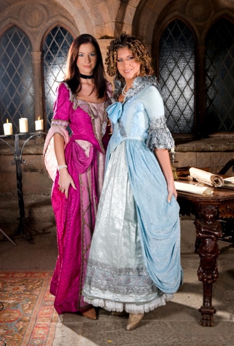 Teen girls don period clothing prior to a threesome in a medieval building 84123889