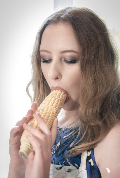 Horny blonde Emma Fantazy slips a cob of corn inside her shaved vagina 60209174
