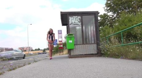 Pretty blonde Claudia Macc takes a piss while waiting to catch a bus 45790001