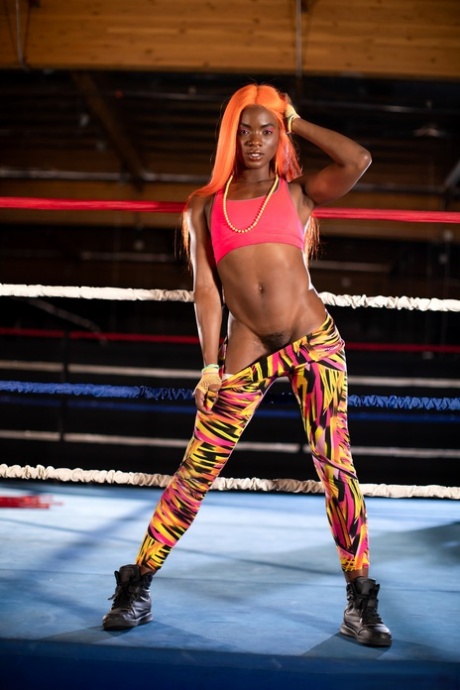 Black girl unveils her athletic body while in a boxing ring 64777010