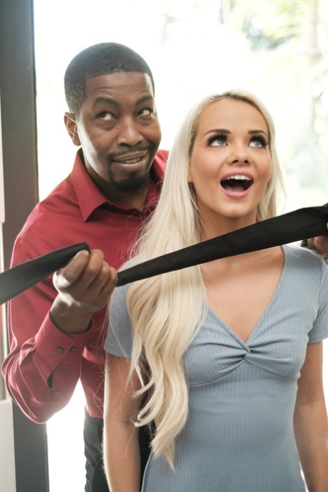 Hot girl Elsa Jean is freed from a blindfold prior to her interracial fucking 72331605