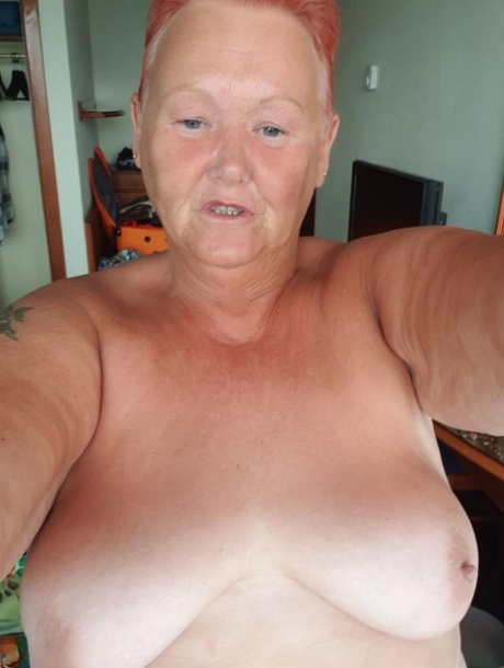 Fat granny with red hair Valgasmic Exposed takes naked selfies at home 94426574