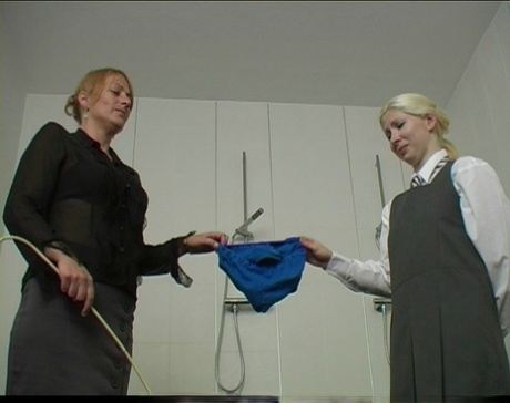 Blonde student is made to get naked before receiving a brutal caning 46409163